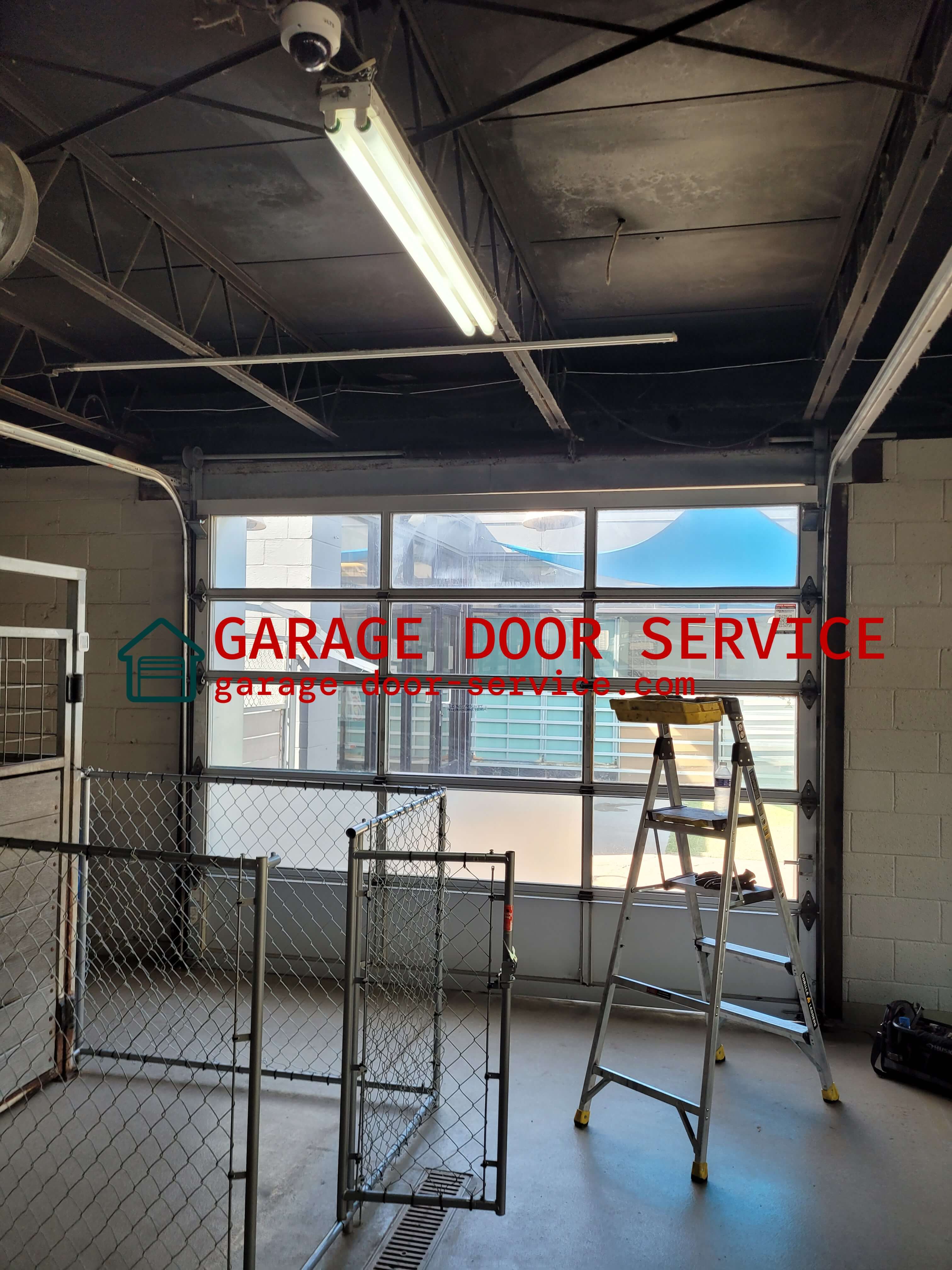 garage-door-service.com_fullview_garage_door_spring_Replacement